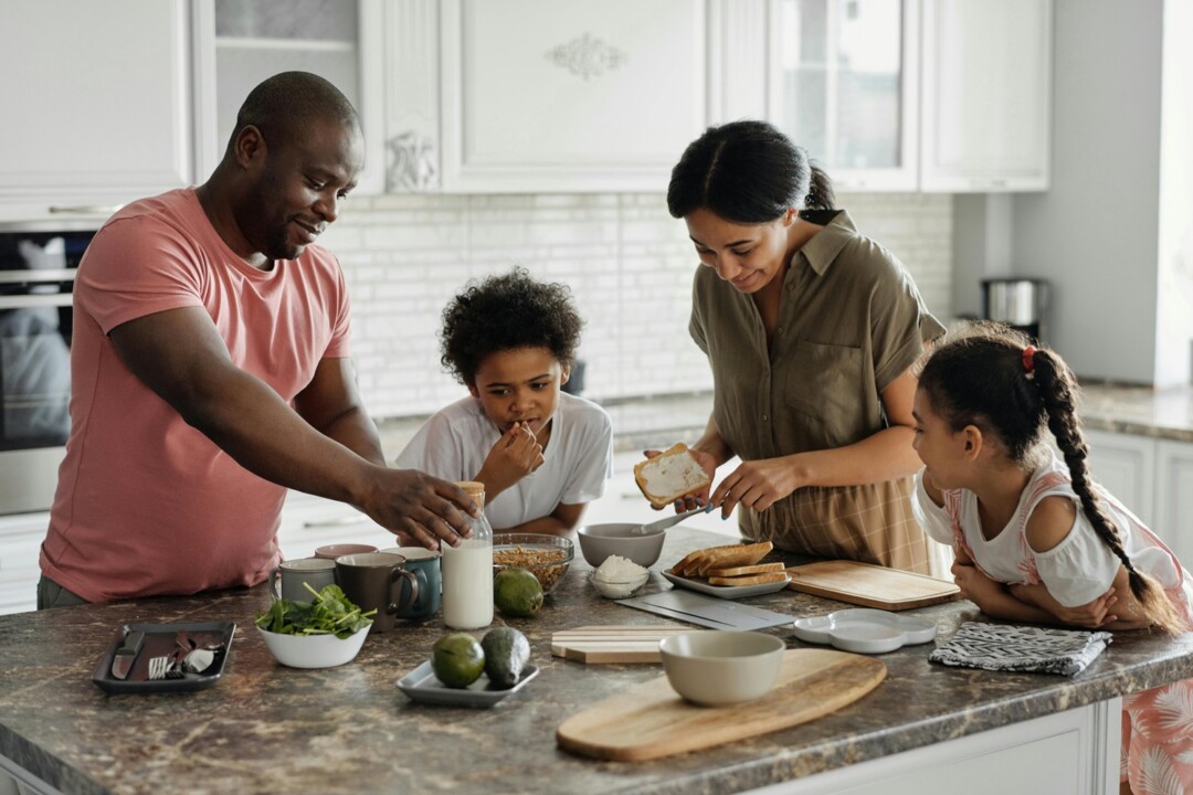 Beautiful family sharing a moment in the kitchen