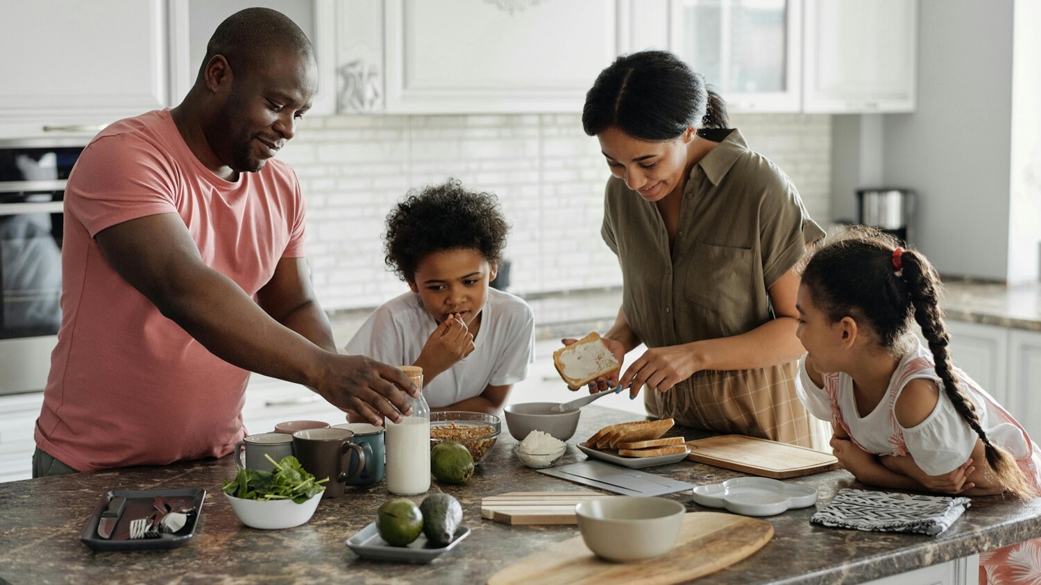 Beautiful family sharing a moment in the kitchen